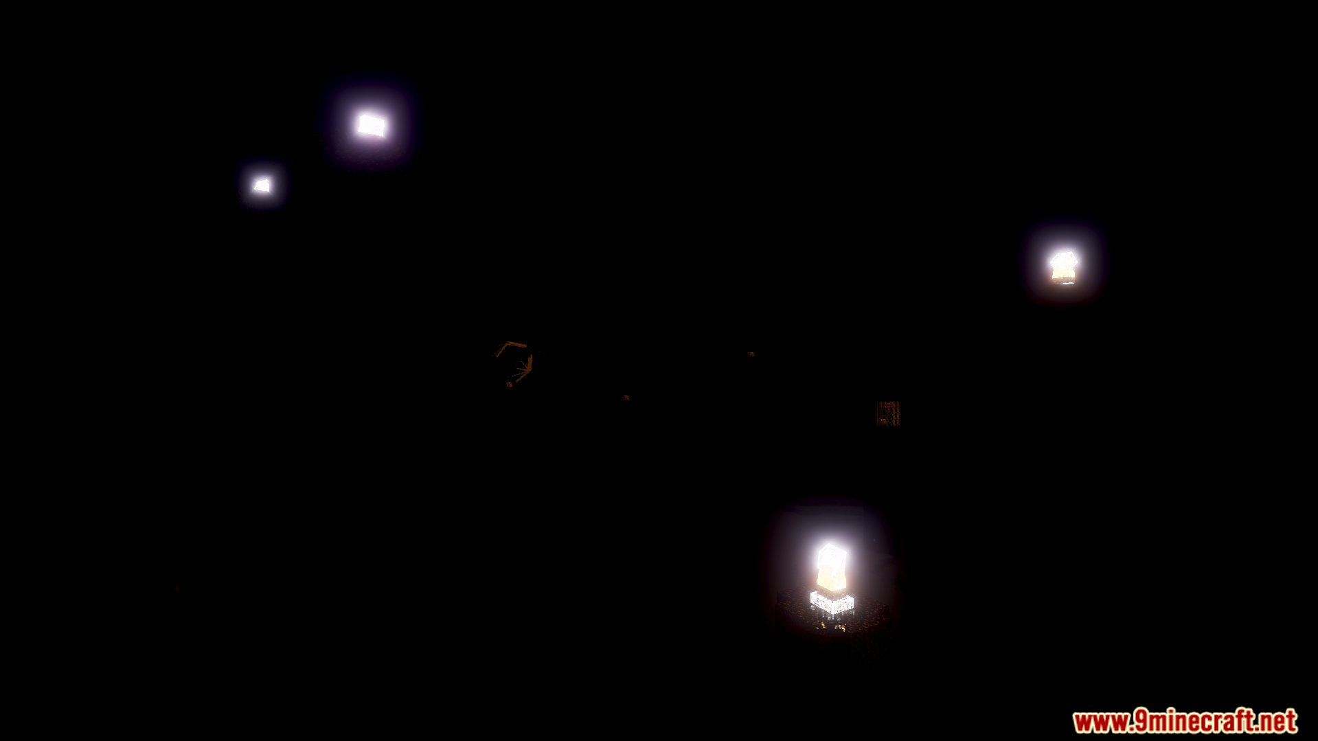 Several bright glowing lights scattered across a dark background