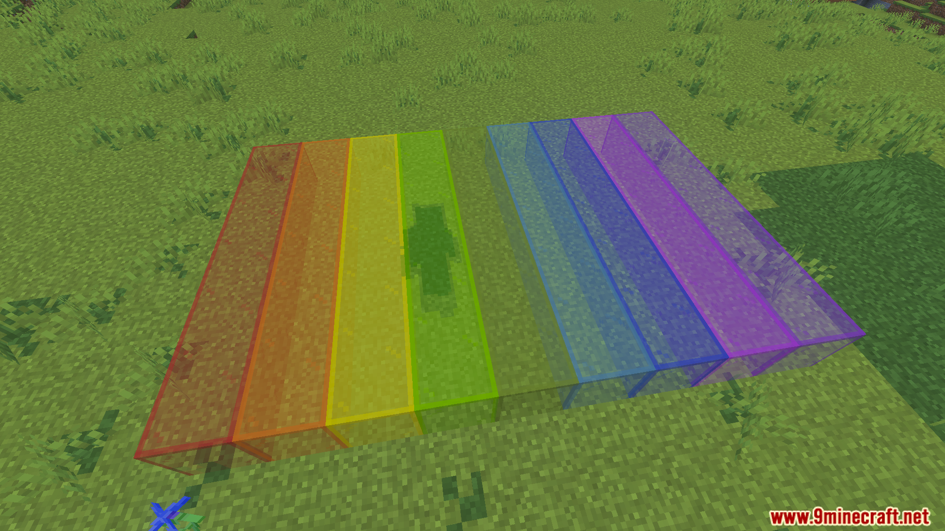 KwZs Connected Glass Addon Screenshot 5 Colorful connected glass blocks in various rainbow colors placed on green grass