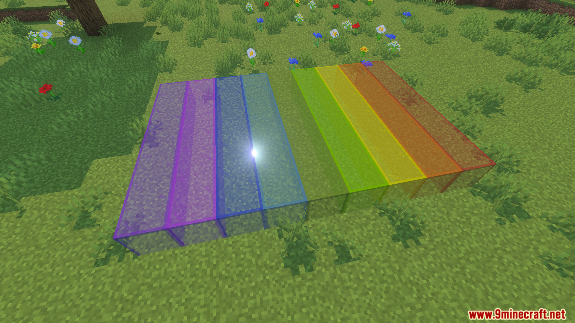 KwZs Connected Glass Addon Screenshot 6 Multiple colored glass blocks connecting seamlessly on a grassy field with flowers