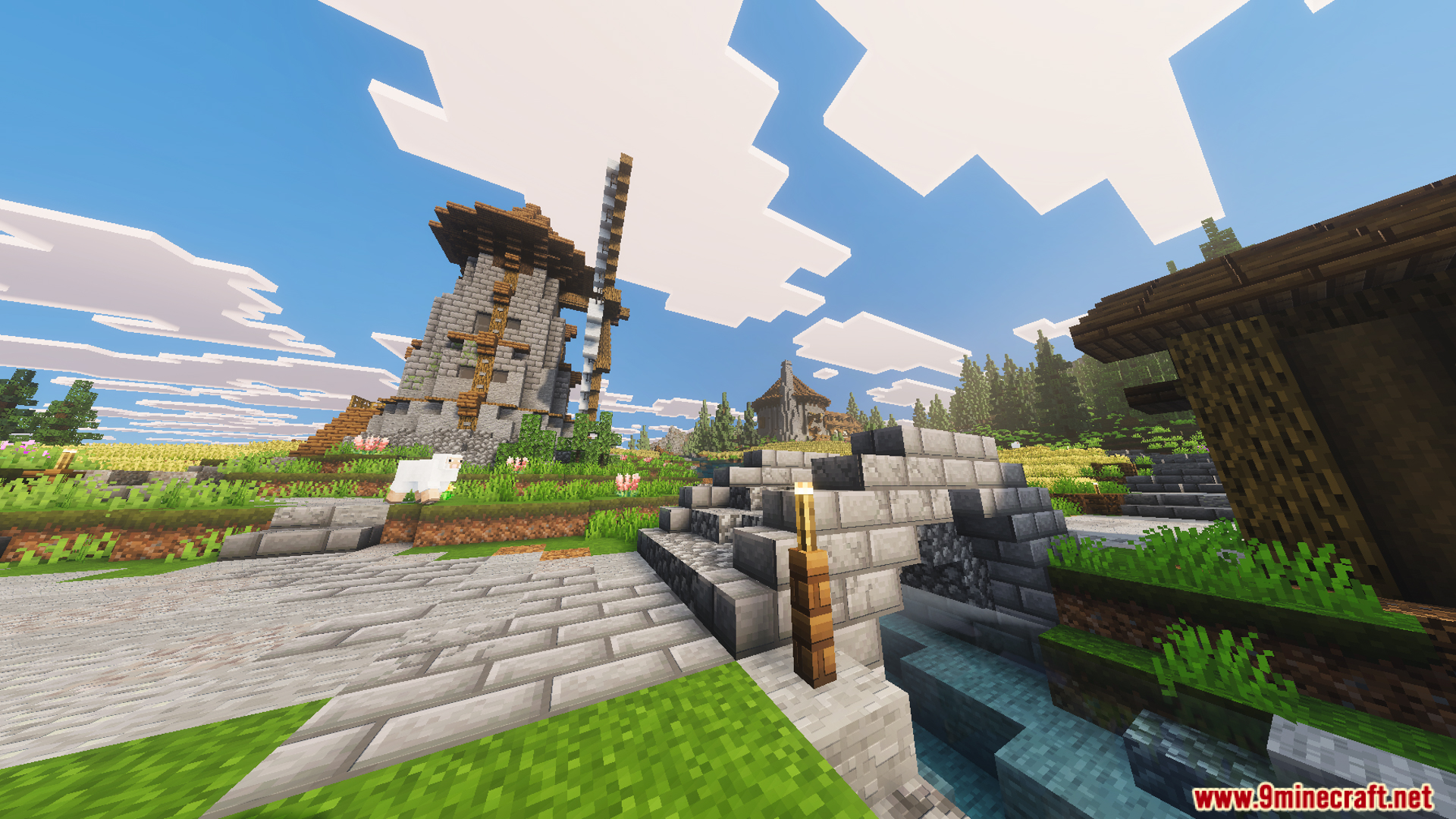 A stone bridge and windmill in the Medieval Village Gendrys Tavern Map