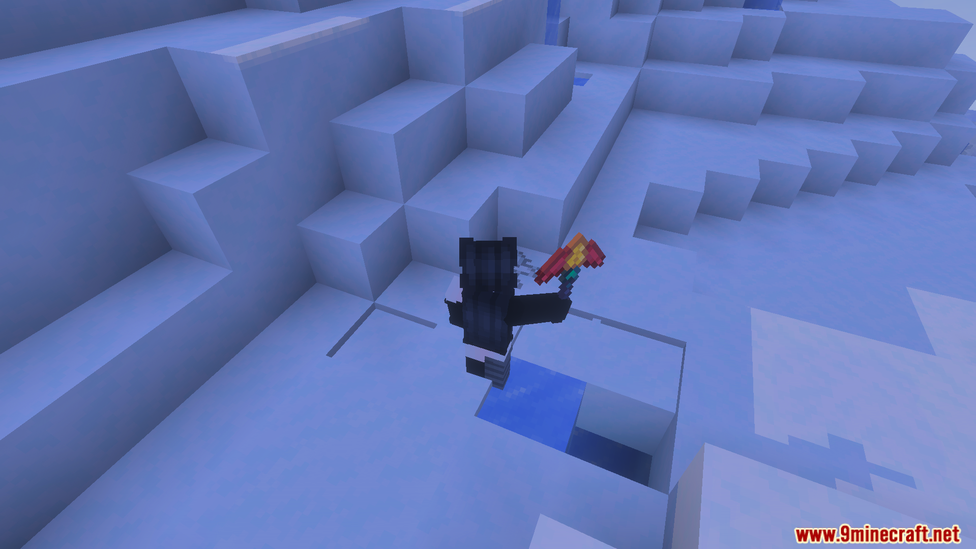 More Vanilla Tools Complete Addon Screenshot 6 Player character holding a custom pickaxe while exploring a snowy ice biome