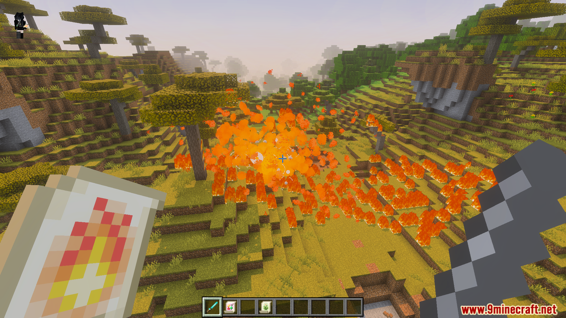 Large fire explosion triggered by a magic scroll in a savanna biome