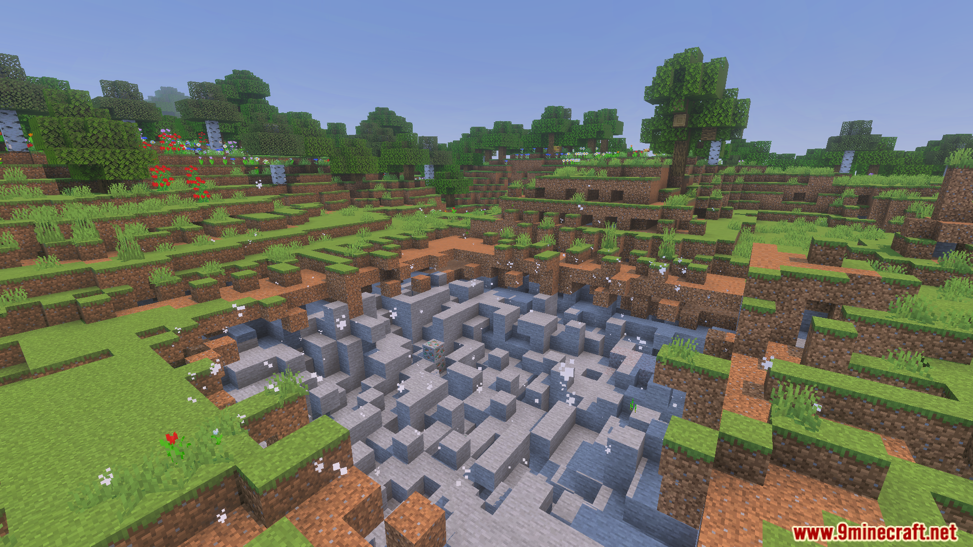 large crater in grassy landscape from blowing up powerful multiplied explosives