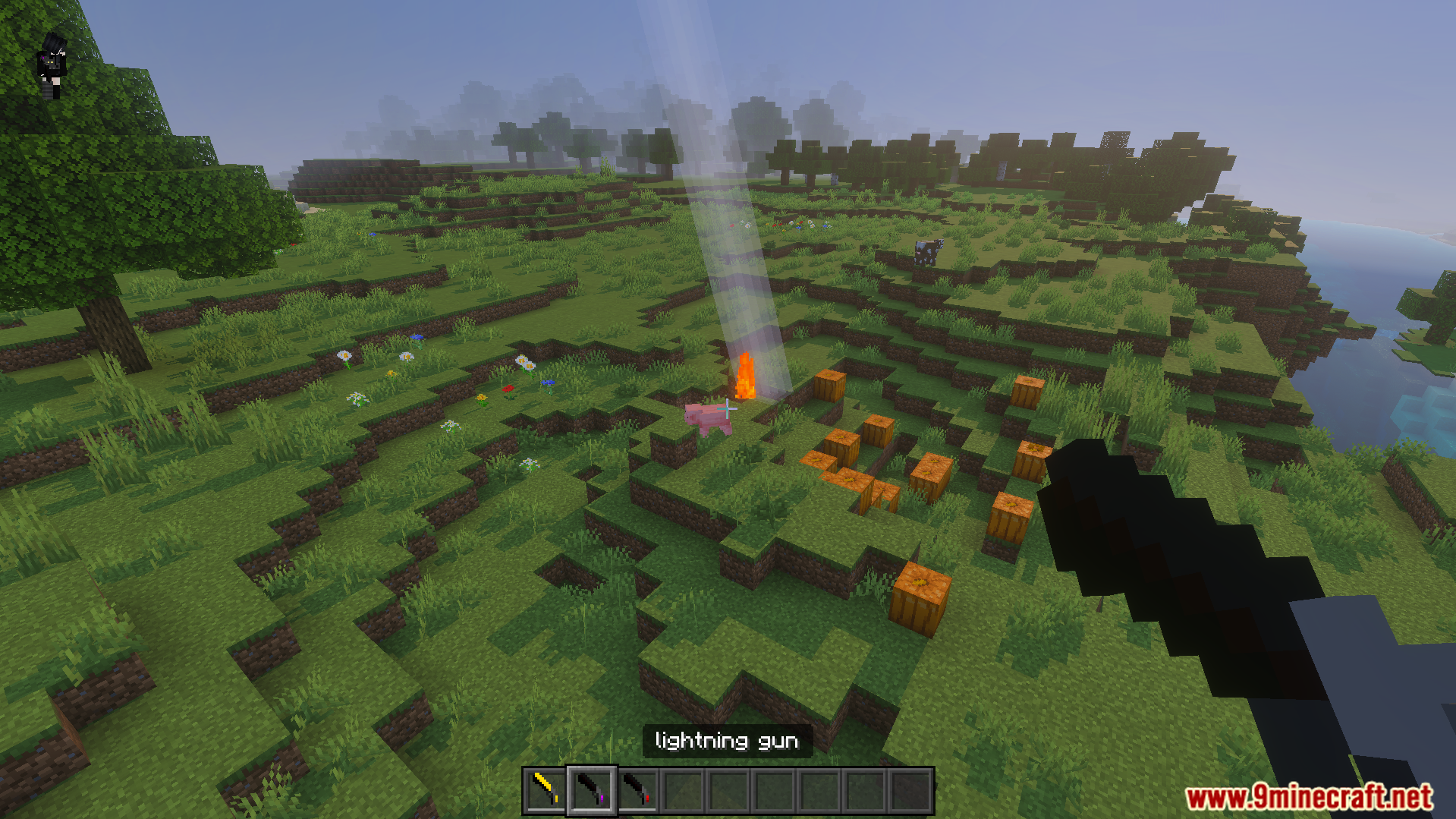 One Shot Gun Addon Screenshot 2 A player holding a lightning gun while a lightning bolt strikes a pig