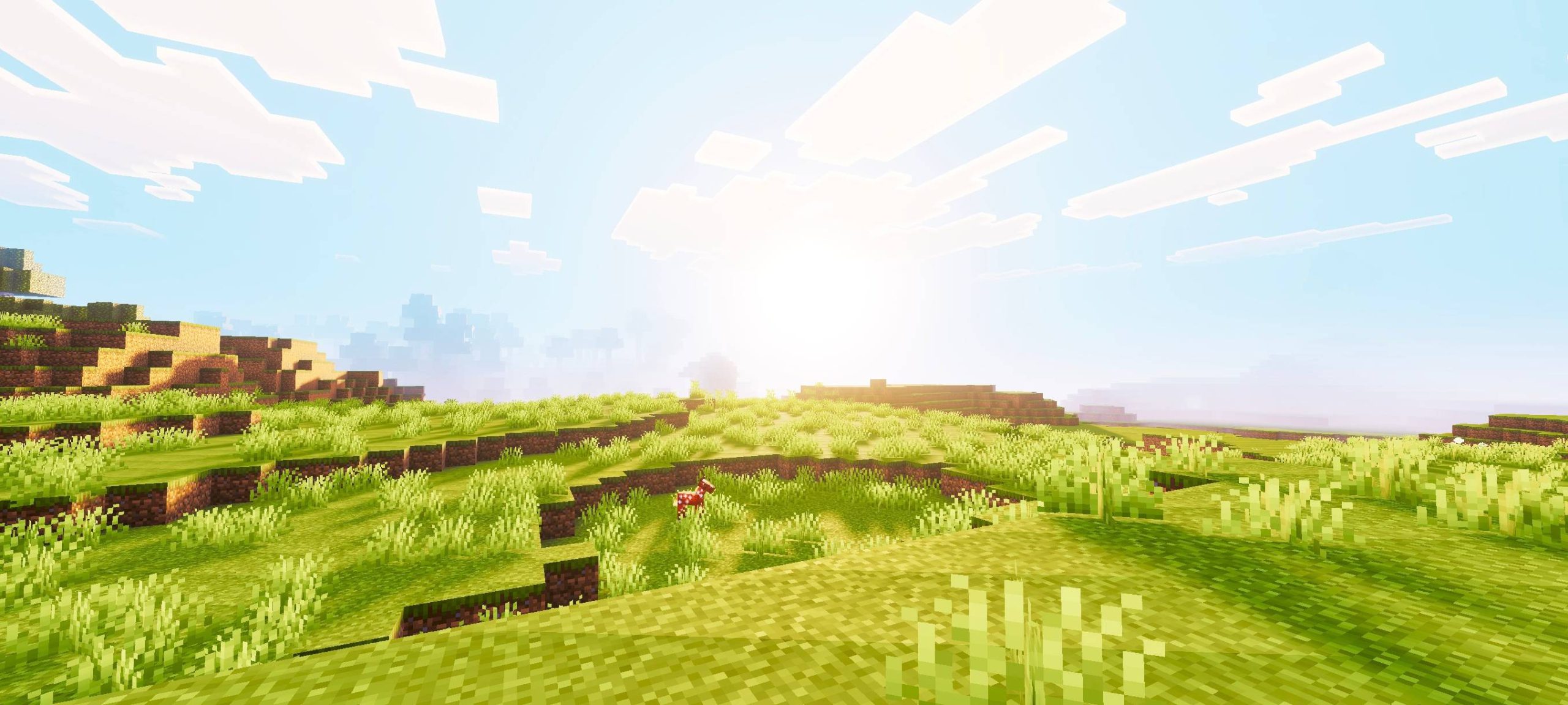 Vibrant green hills and a mob under a bright sun with soft lighting