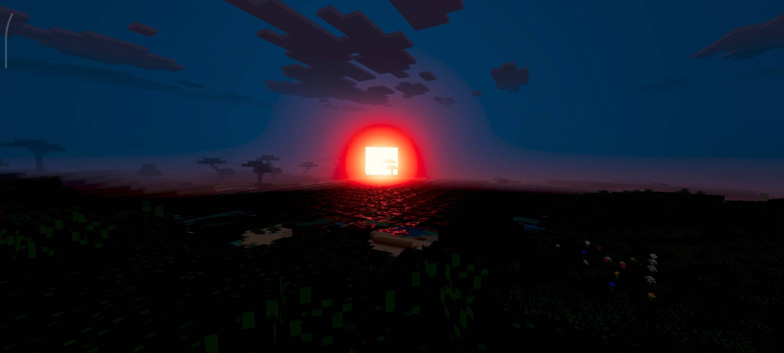 Deep red sun setting over a dark landscape with soft vibrant visuals