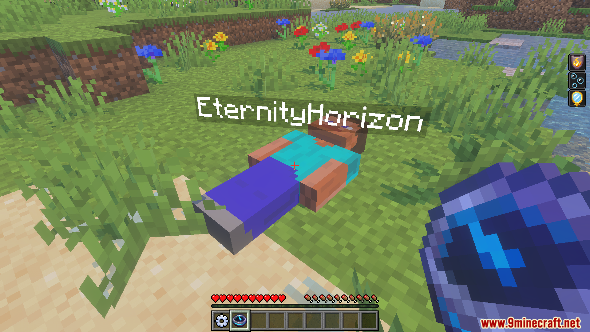 First person view of a dead body with a name tag and recovery compass