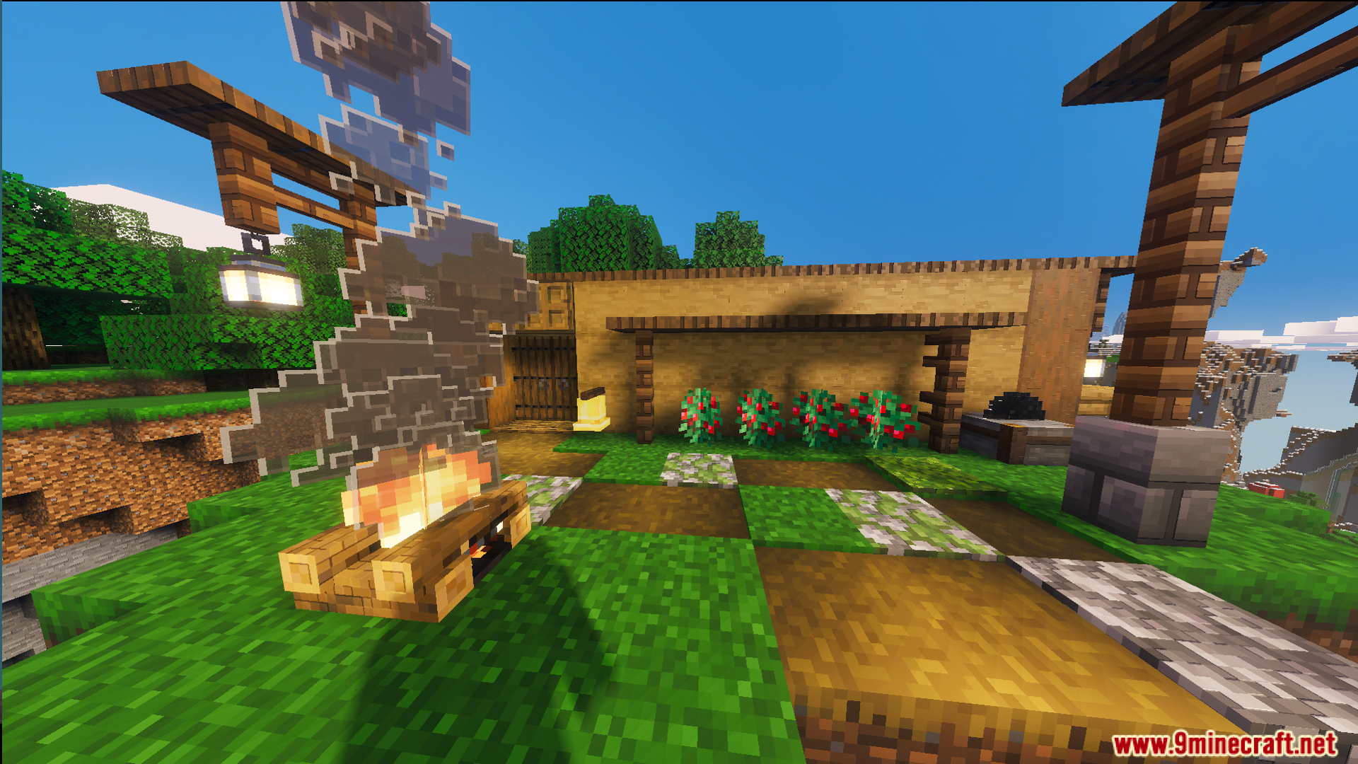 A campfire and small farm located right next to the wooden house