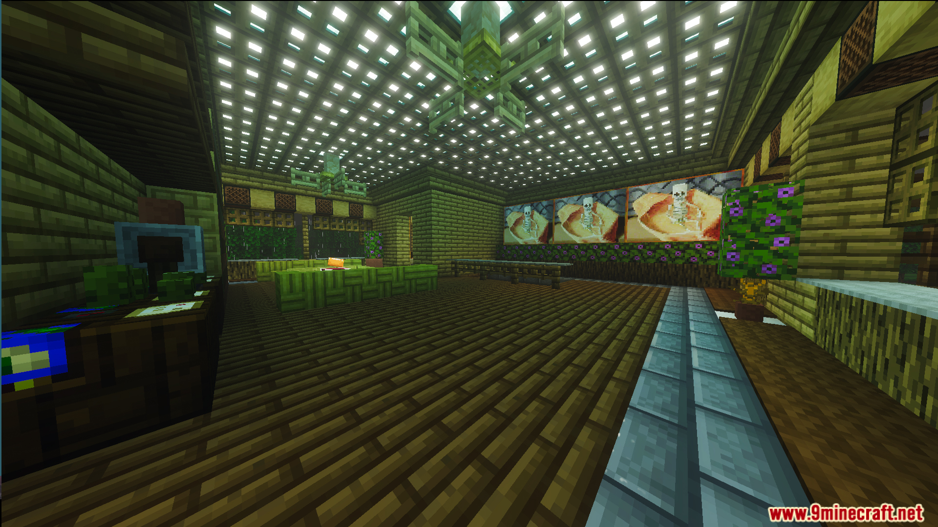 Spacious interior room with wooden floors and skeleton paintings on the wall