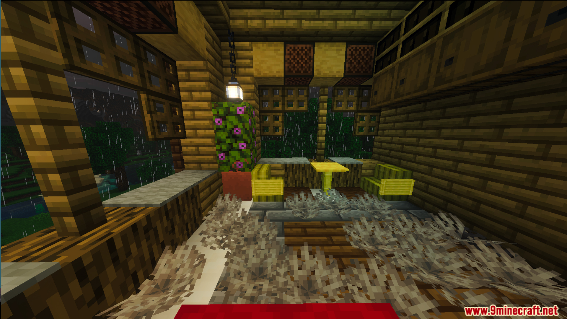 Small dining area with yellow chairs and a table inside the survival house