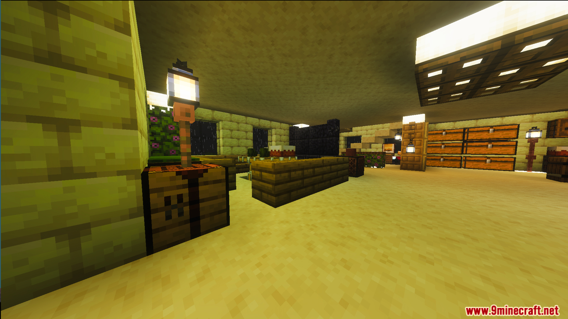Spacious interior room featuring storage chests crafting table and a cake on the counter