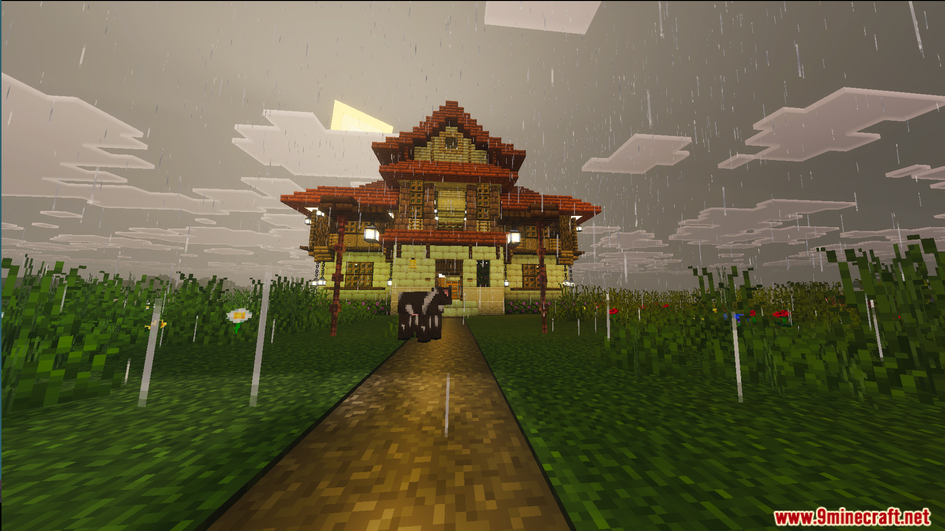 A large two story traditional house with a red roof during a rainstorm
