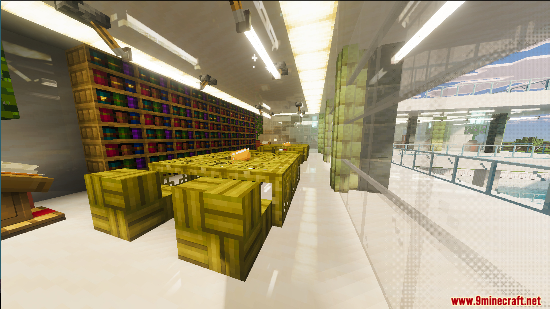 Modern library room with bookshelves and tables inside the fully furnished mansion
