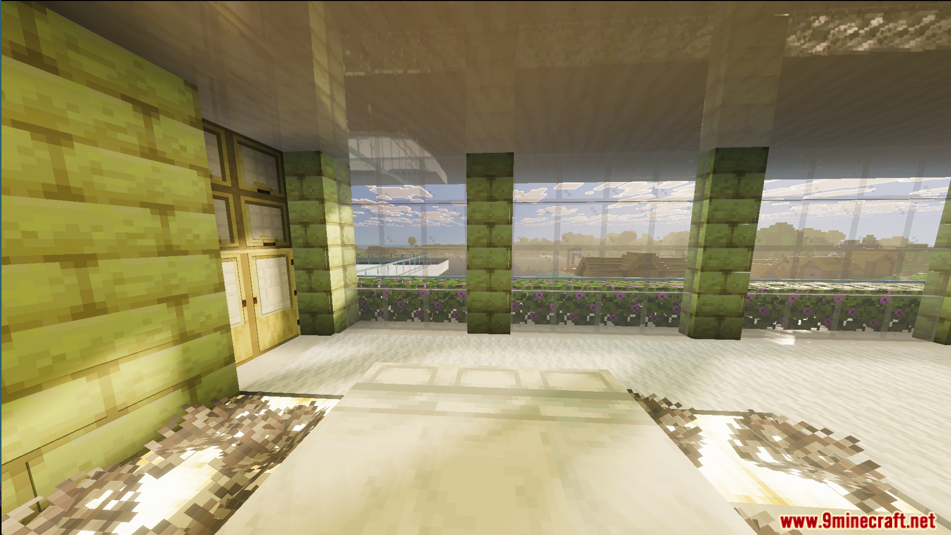 Cozy bedroom interior with a white bed and decorative green stone pillars