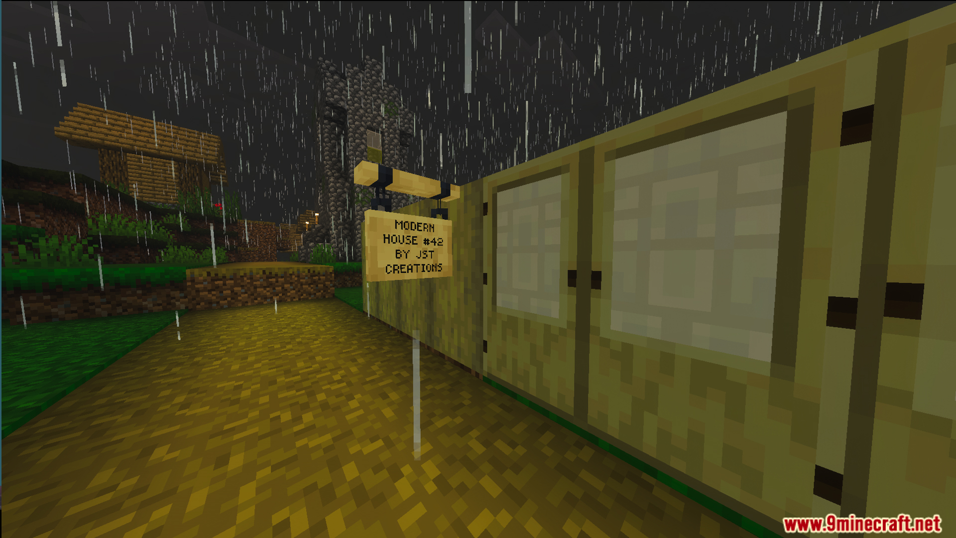 Wooden sign for Survival Modern House 42 Map next to a village