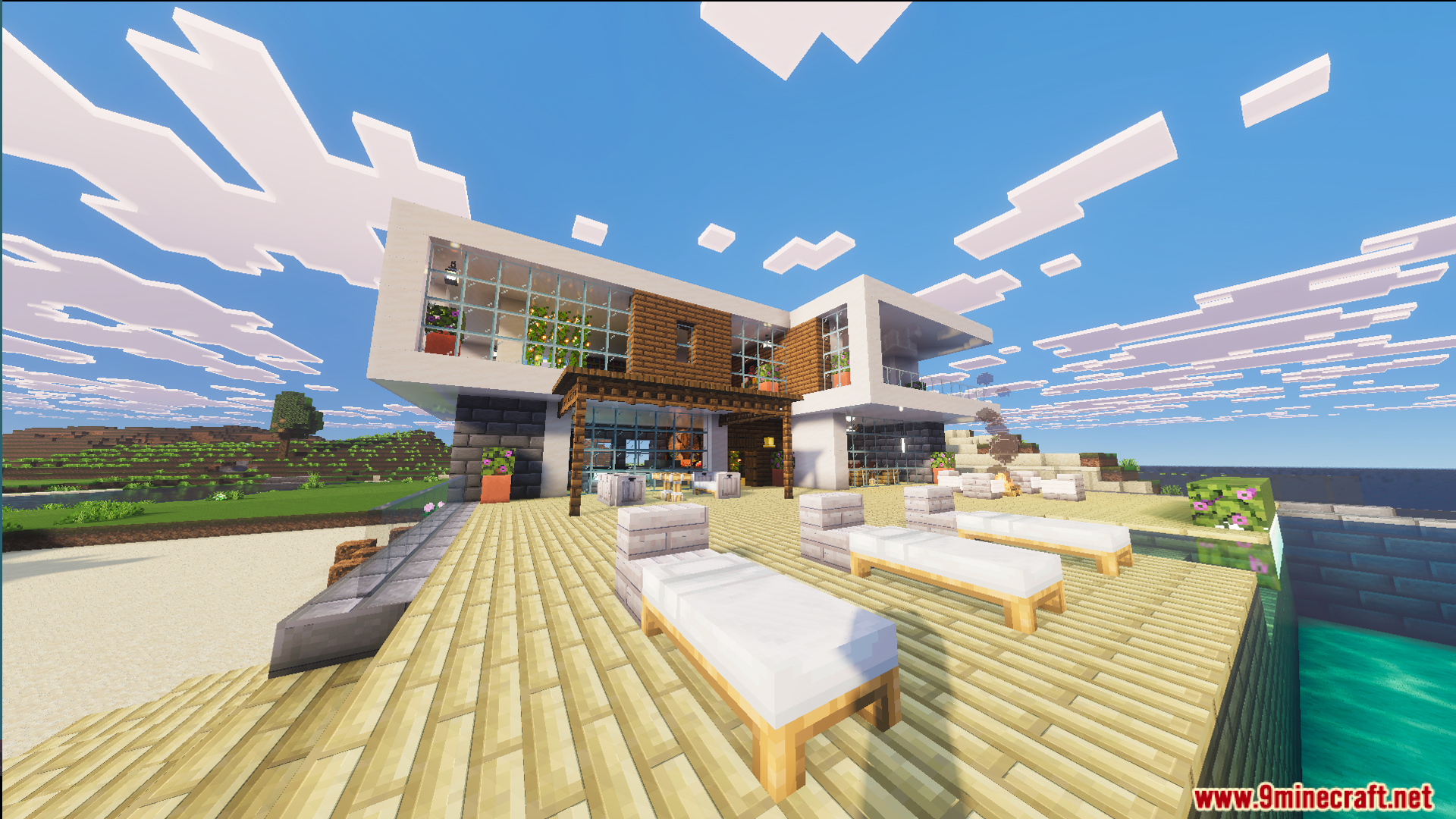 Survival Modern House 84 Map Screenshot 2 Outdoor patio with sun loungers and a swimming pool overlooking the ocean