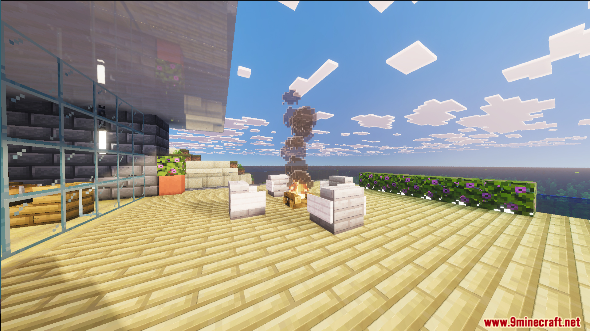 Survival Modern House 84 Map Screenshot 3 Outdoor seating area with a campfire on a wooden deck overlooking the ocean