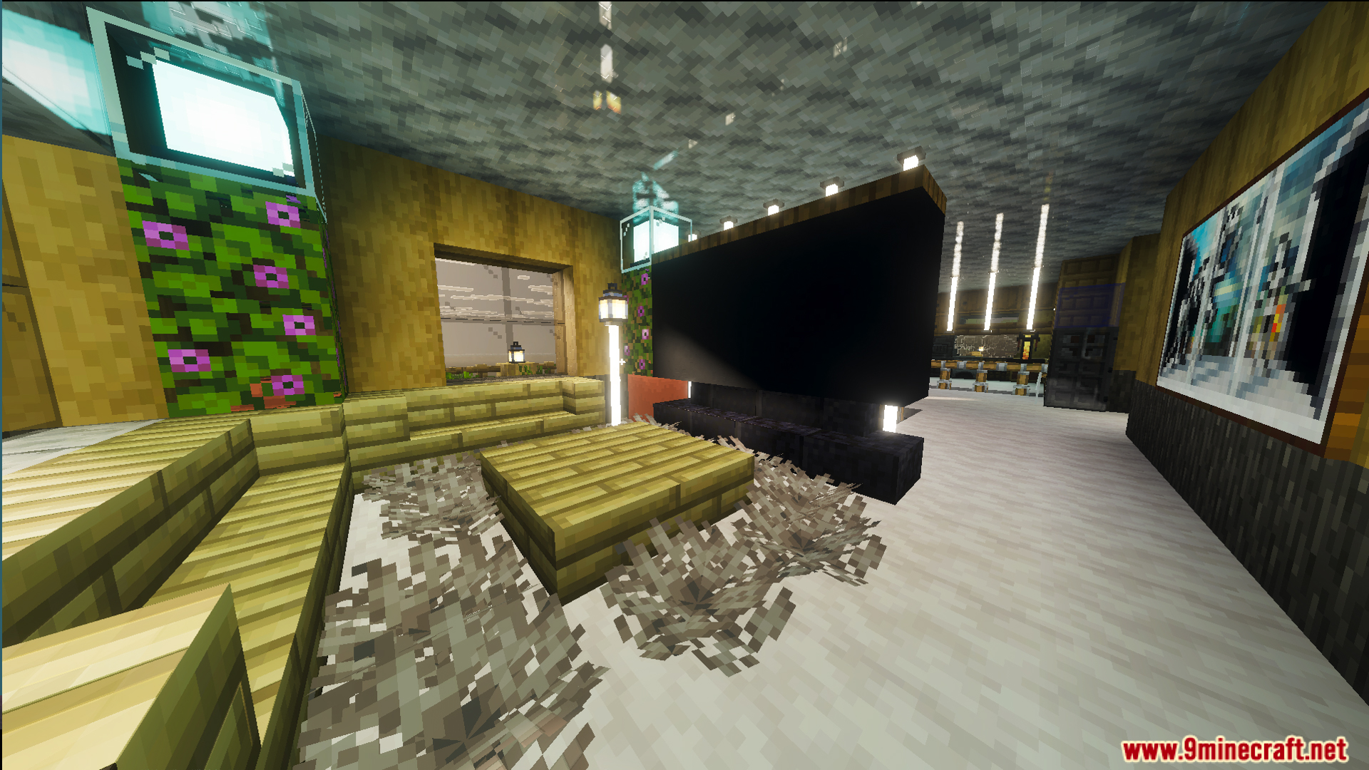 Modern living room interior with a large television and comfortable seating area
