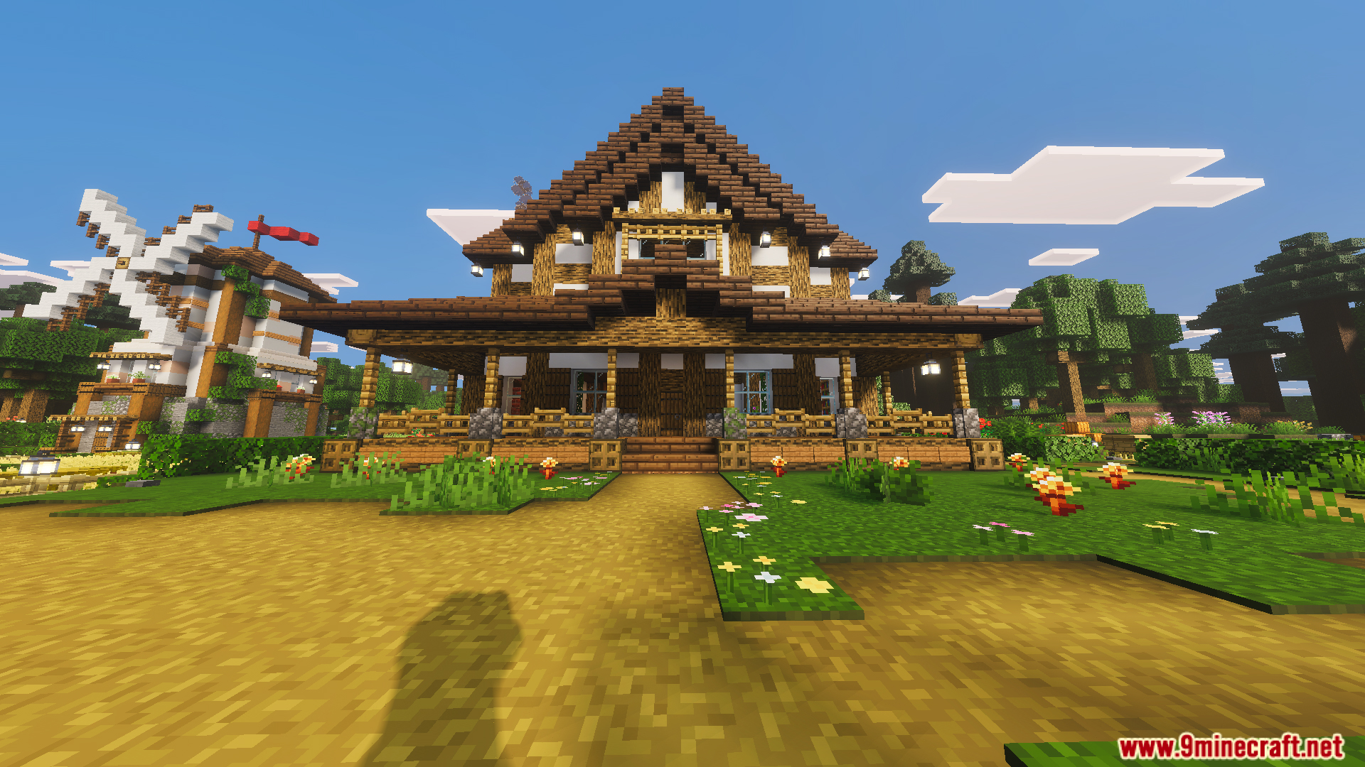 Tiny Takeover Farmstead Map Screenshot 2 Front view of a large wooden farmhouse with a nearby windmill