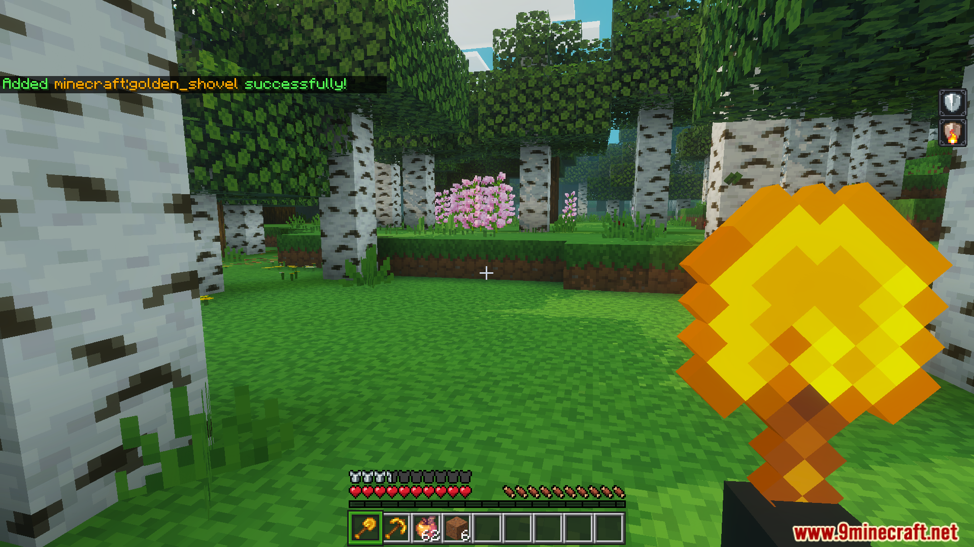 Player holding a golden shovel in a birch forest