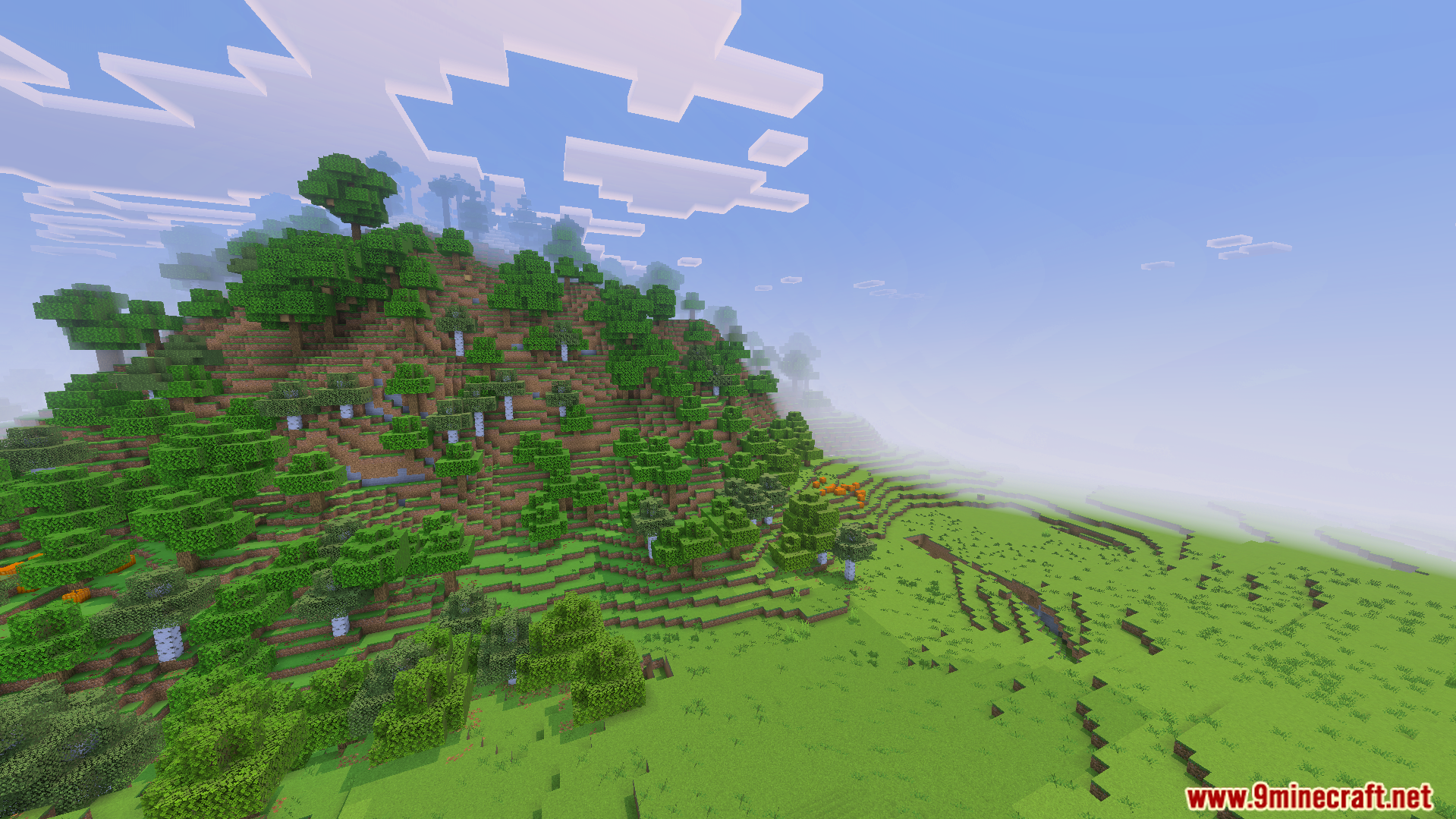Ultimate FPS Booster Texture Pack Screenshot 4 Lush green landscape with trees and clear skies in an optimized world