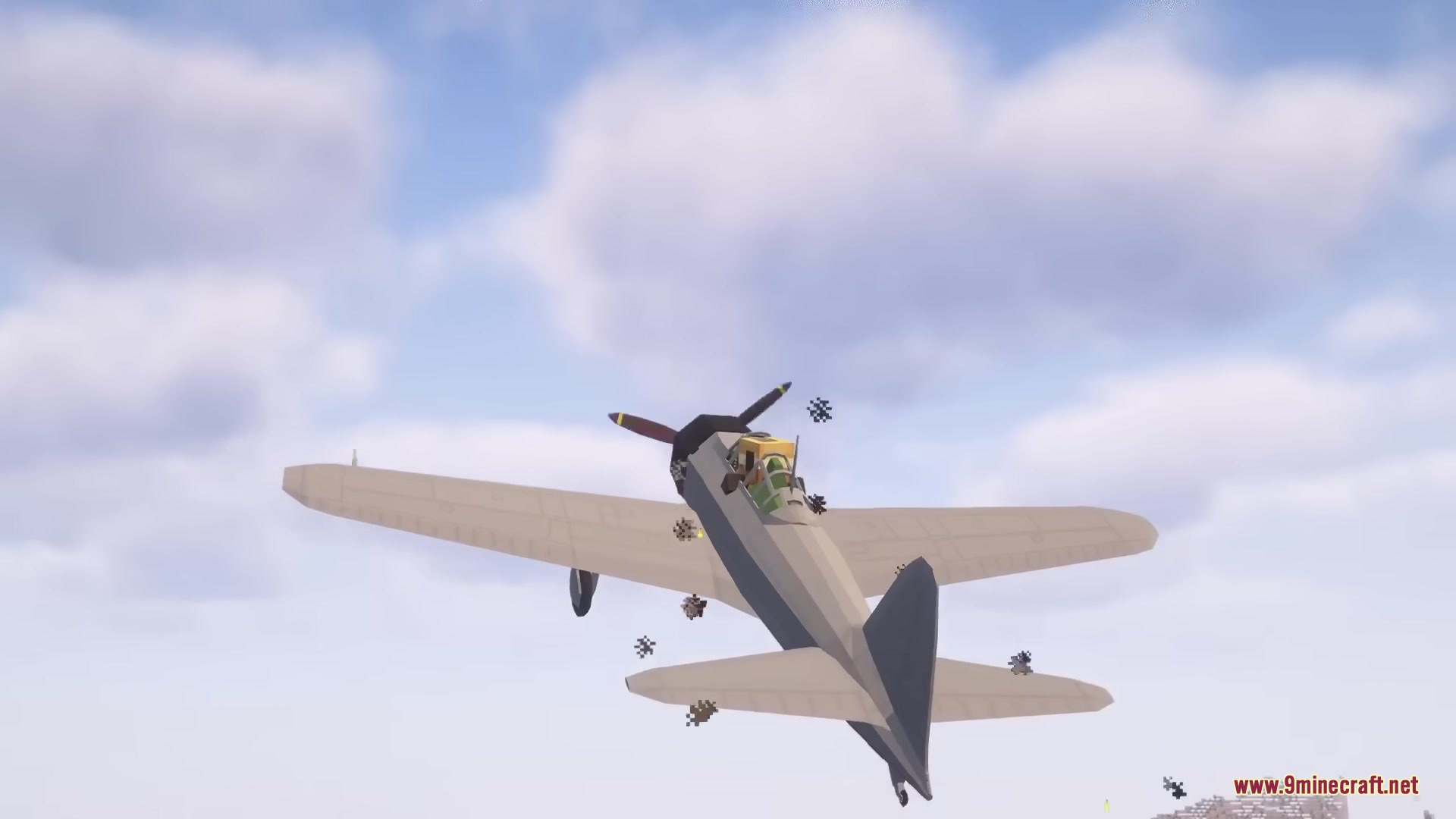 Warfare Wings Mod Screenshot 2 A vintage fighter plane flying through the cloudy sky in a Minecraft world