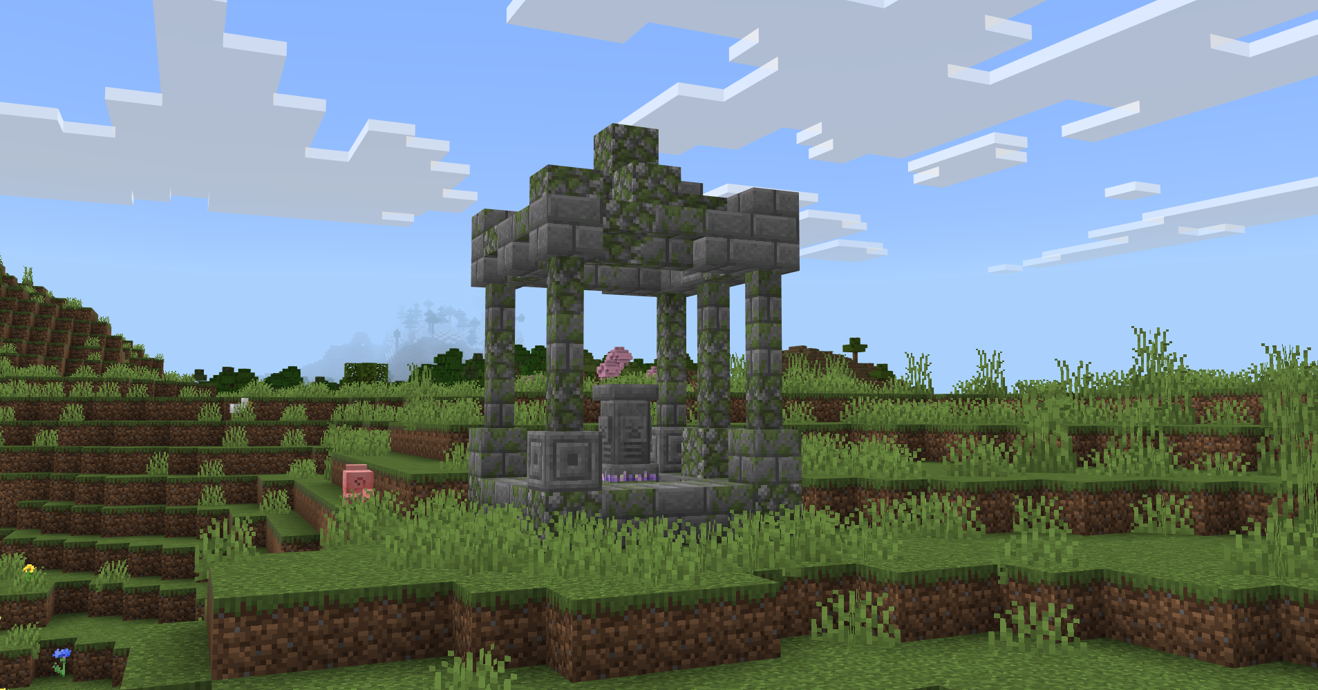 Mossy stone shrine containing a waystone in a green grassy overworld biome