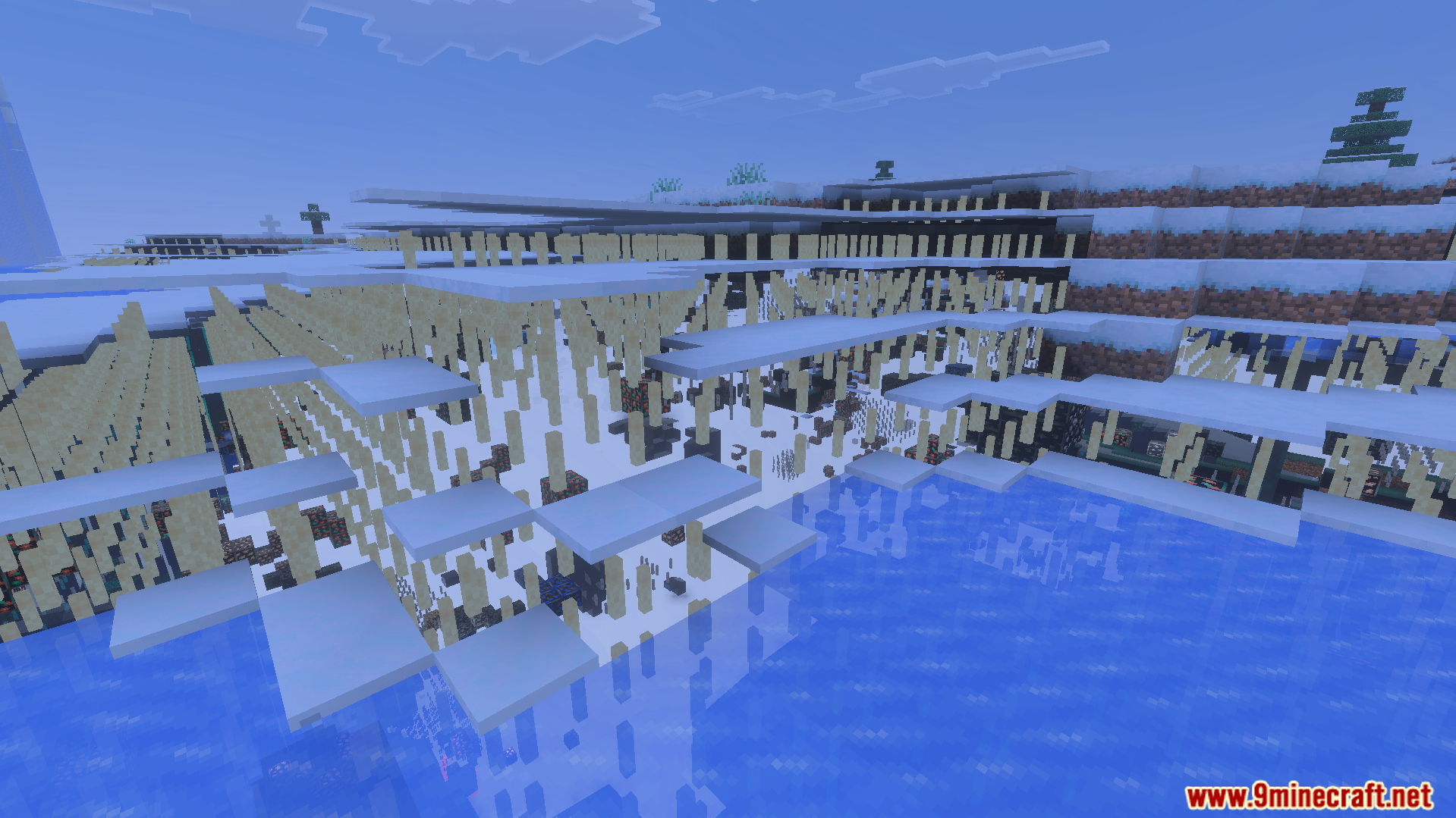 Transparent ground blocks reveal hidden ores and structures in a snowy landscape